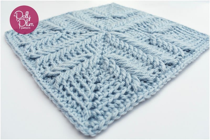 A free crochet pattern for a blue square with a pattern on it.