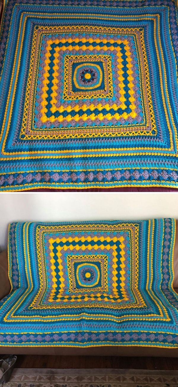 A colorful crochet throw blanket with a geometric square pattern in blue, yellow, and green draped over a couch.