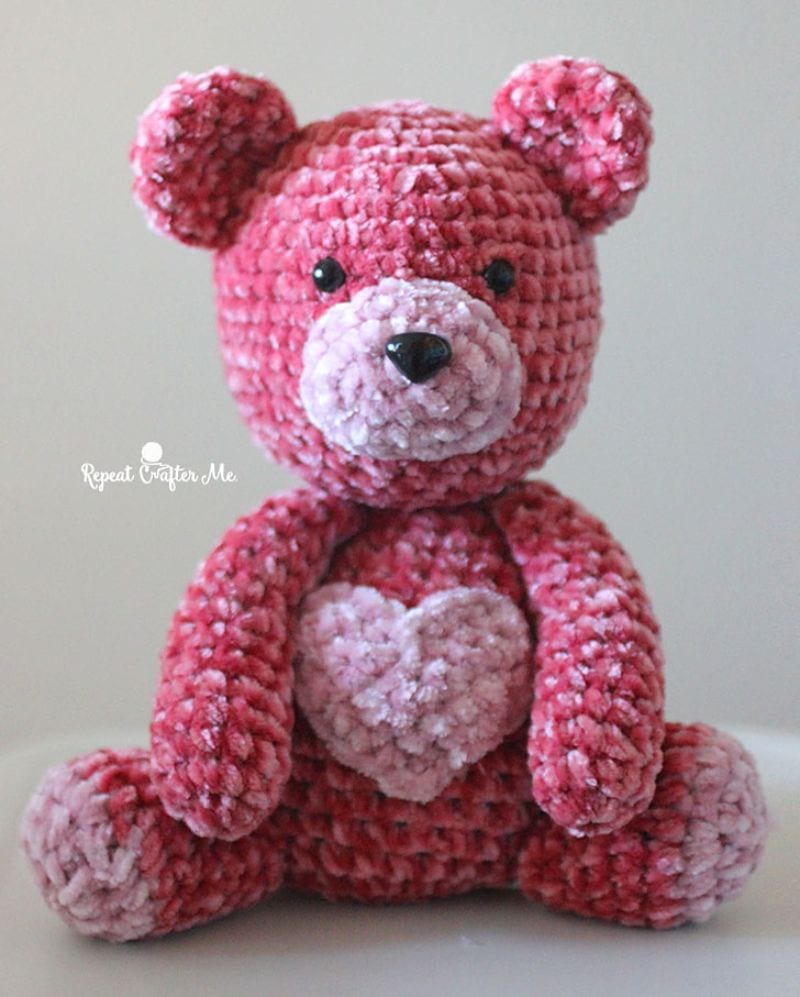 pink velvet Valentine crochet bear with a heart on its tummy