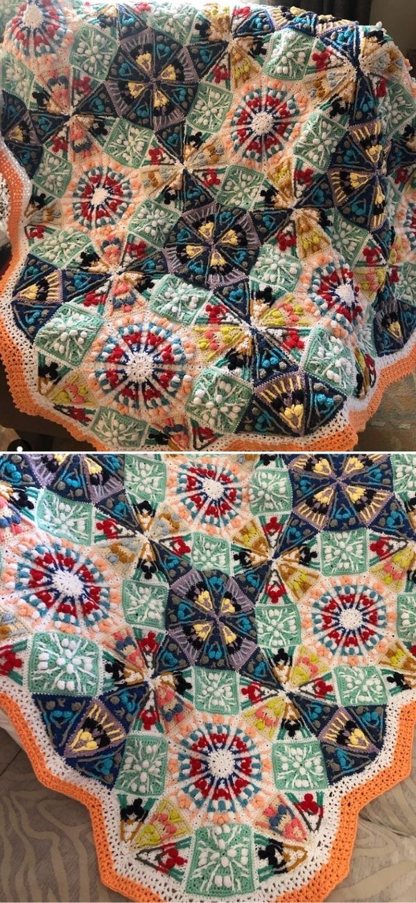 A colorful crochet blanket, perfect as a cozy throw, showcases hexagonal patterns adorned with a floral motif, elegantly draped over a surface.