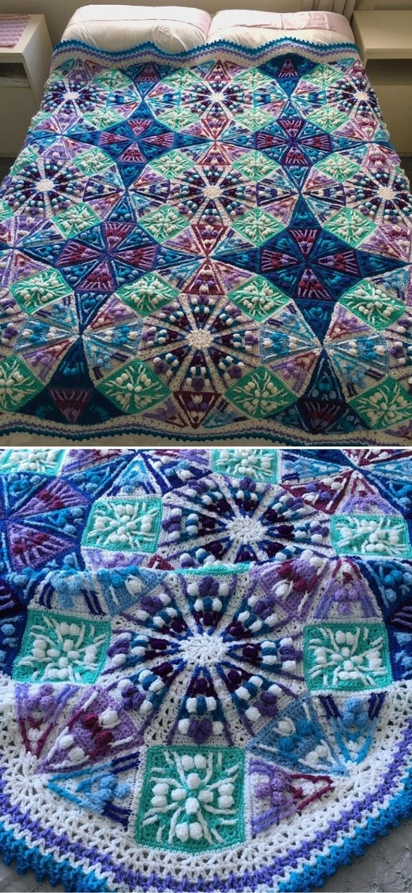 A colorful quilt with a geometric pattern and crochet throws covers a bed. The design features blue, purple, and green tones with intricate shapes and details.
