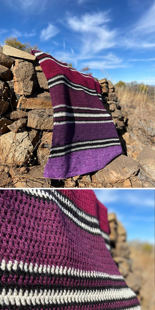 A crochet blanket on a rock.