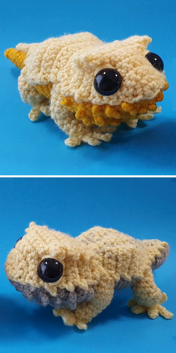 A crocheted dragon on a blue background.