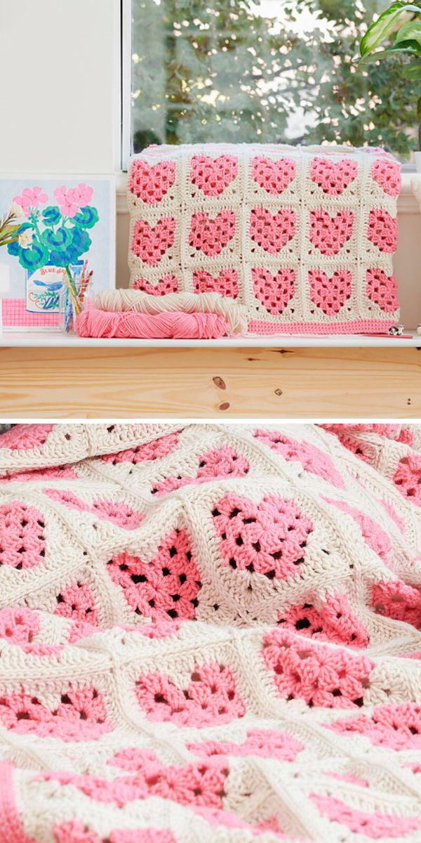 A pink and white throw blanket with hearts.