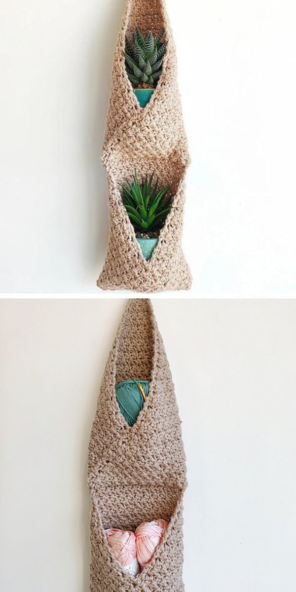 A crocheted plant holder hanging on a wall.