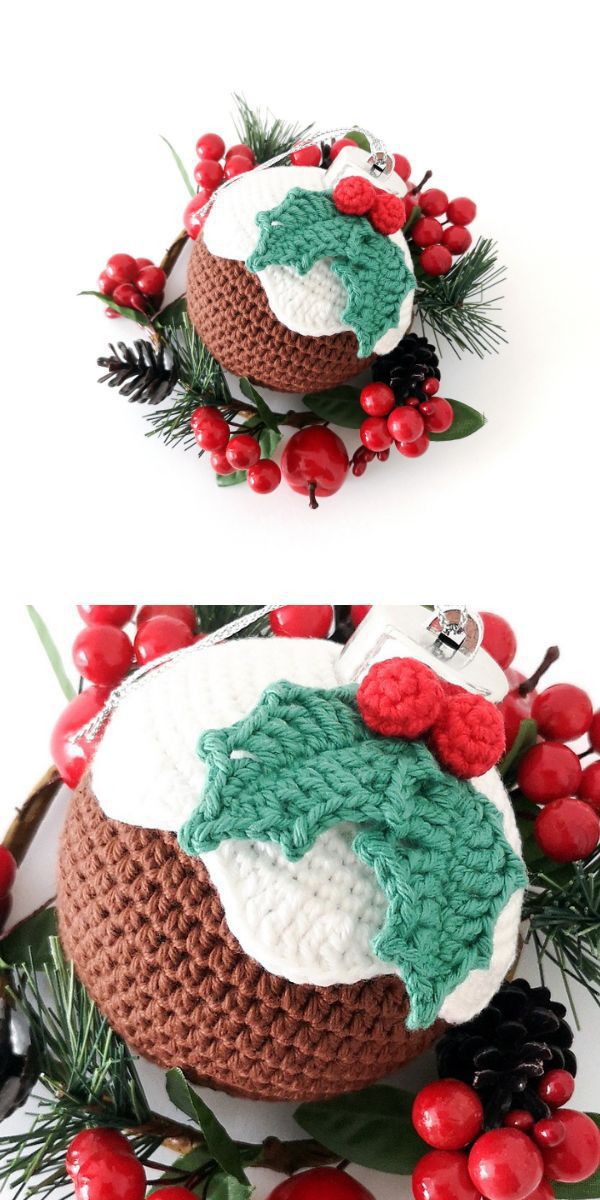 A crochet bauble ornament resembling a Christmas pudding, adorned with holly and berries.