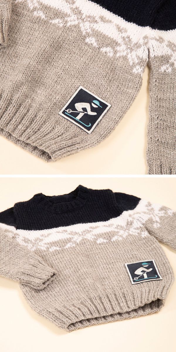 Two knitted baby sweaters with a patch on them.