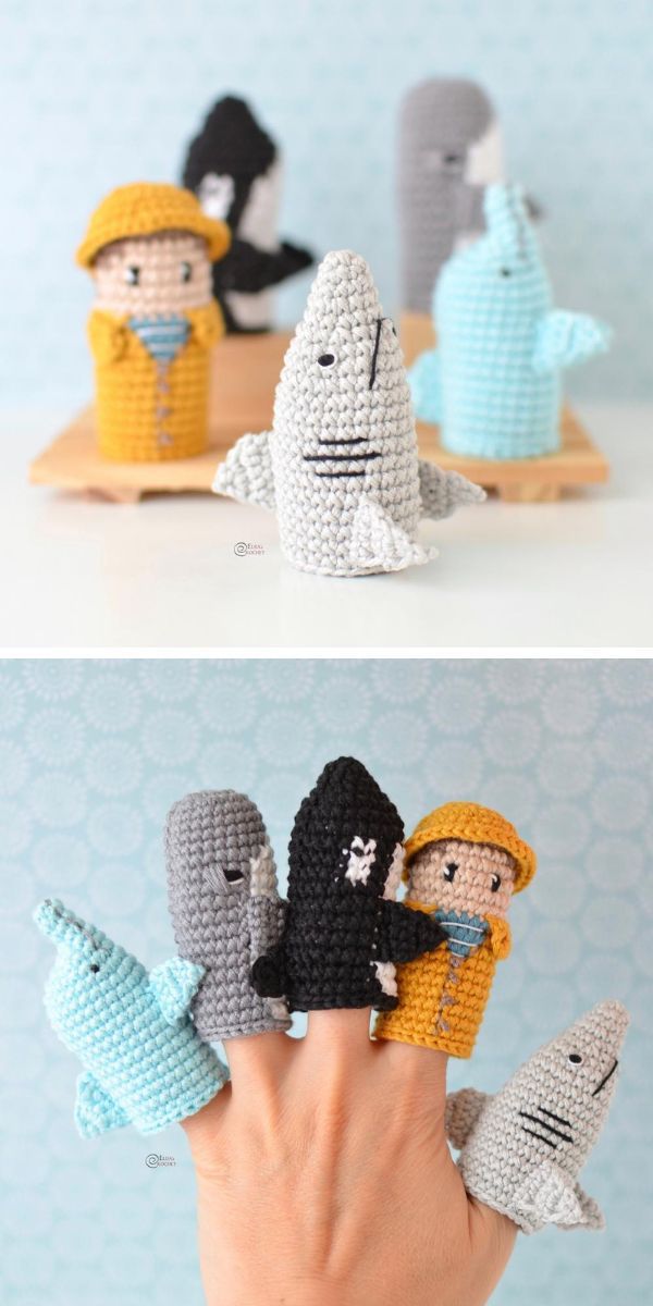 A pair of crocheted finger puppets with sharks, perfect as crochet baby toys.