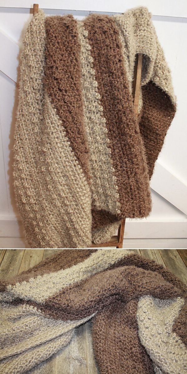 A brown and beige bobble blanket on a chair.