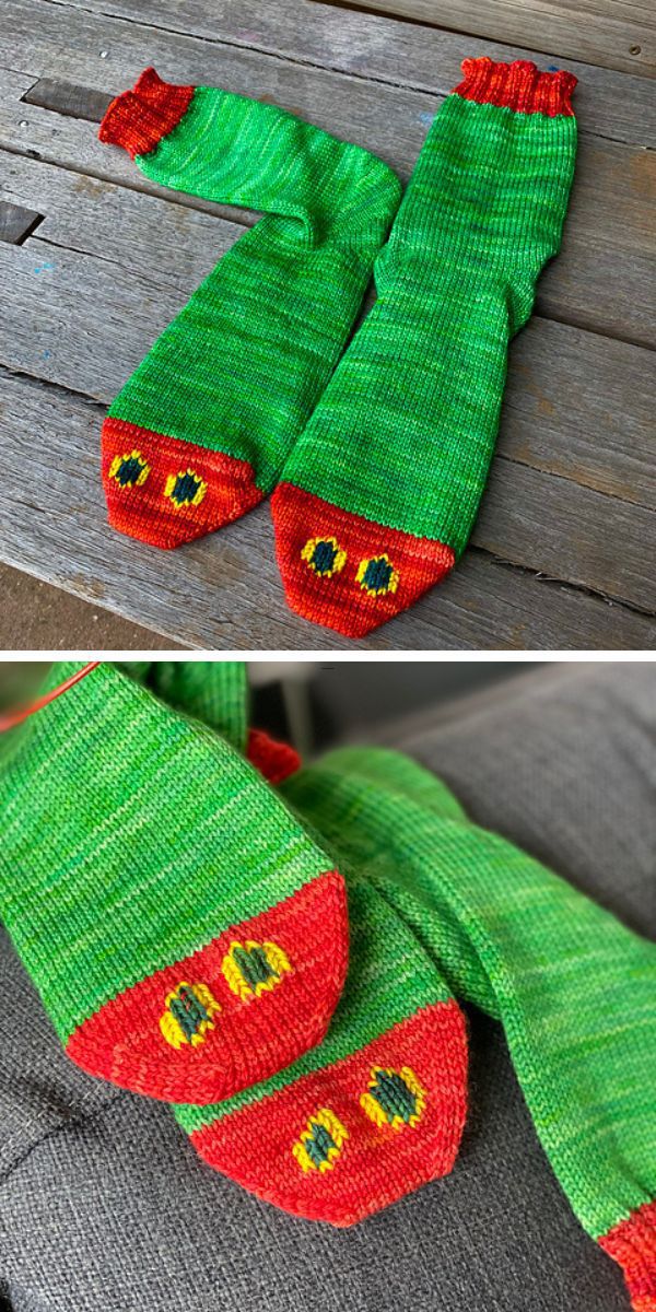 A pair of knitted green and red socks on a couch.