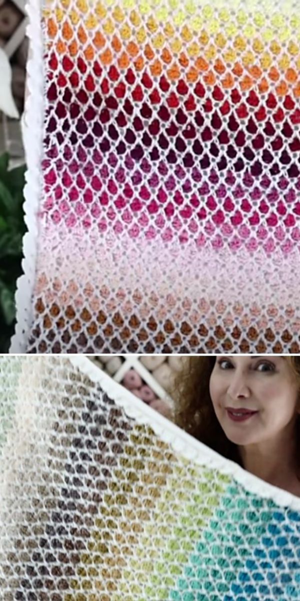 A woman is holding a mosaic crochet blanket.