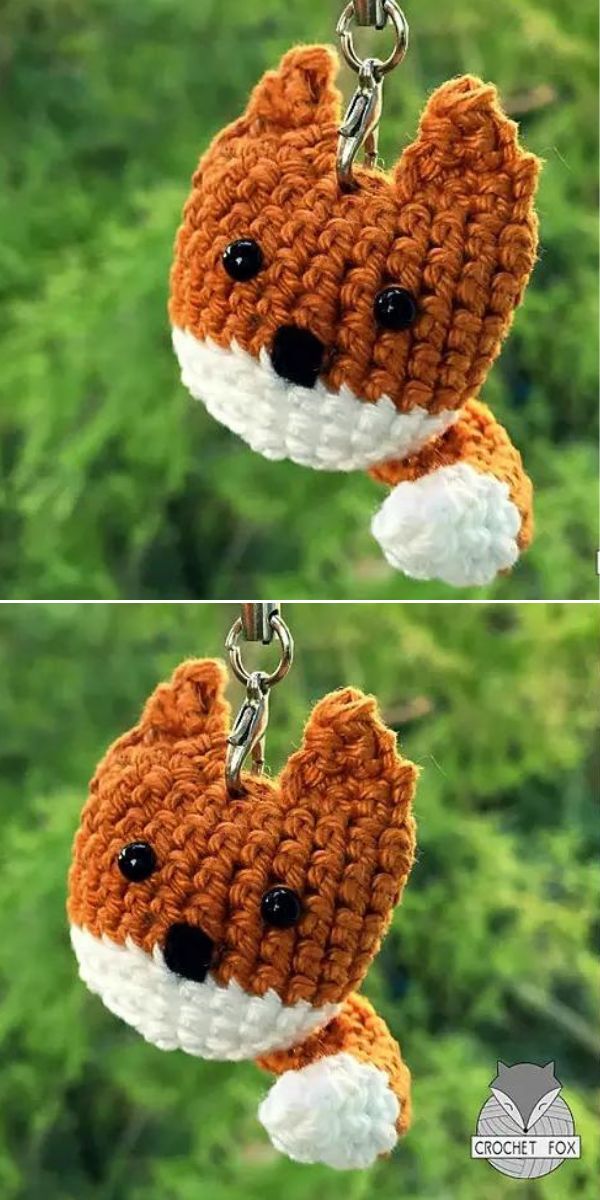 Crocheted fox keychain with a green background.