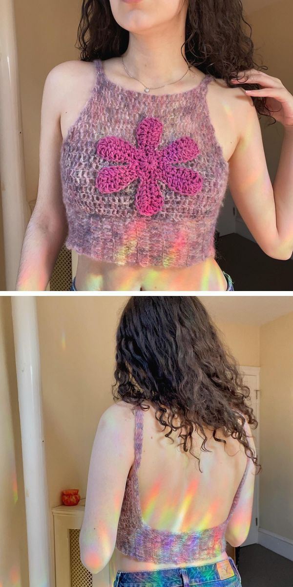 a woman wearing a crocheted crop top with a big flower motif on the front