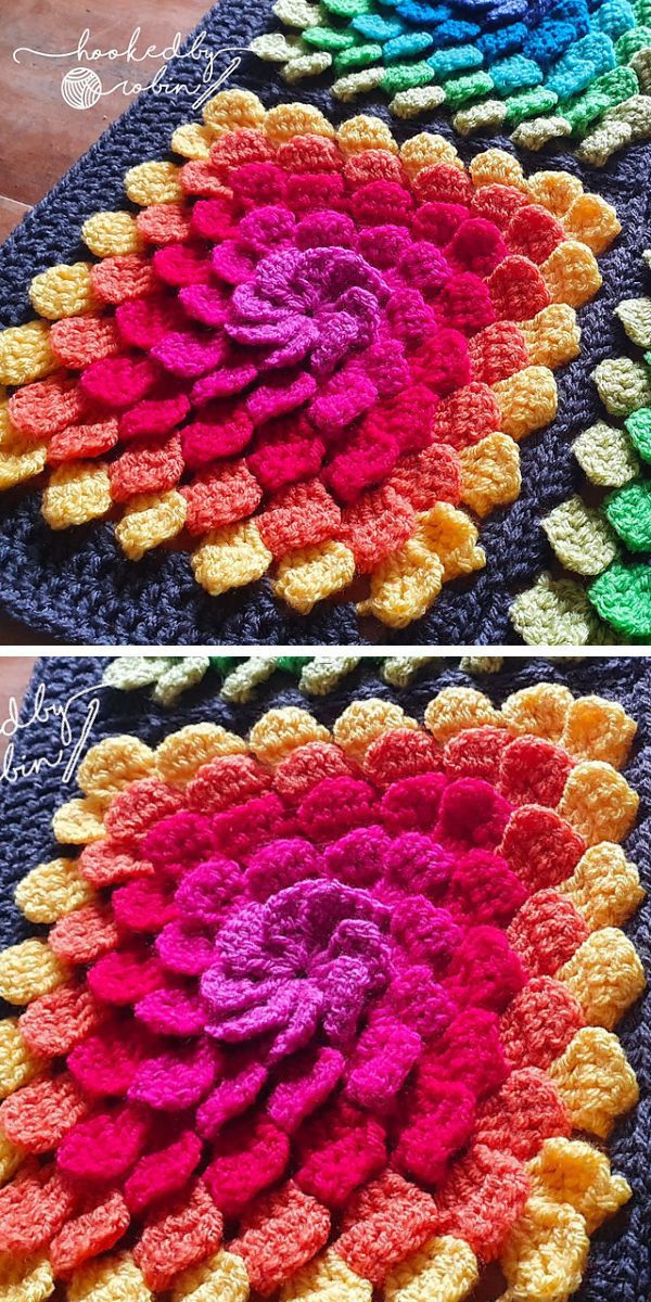 a crochet square with a 3D flower motif in multiple colors