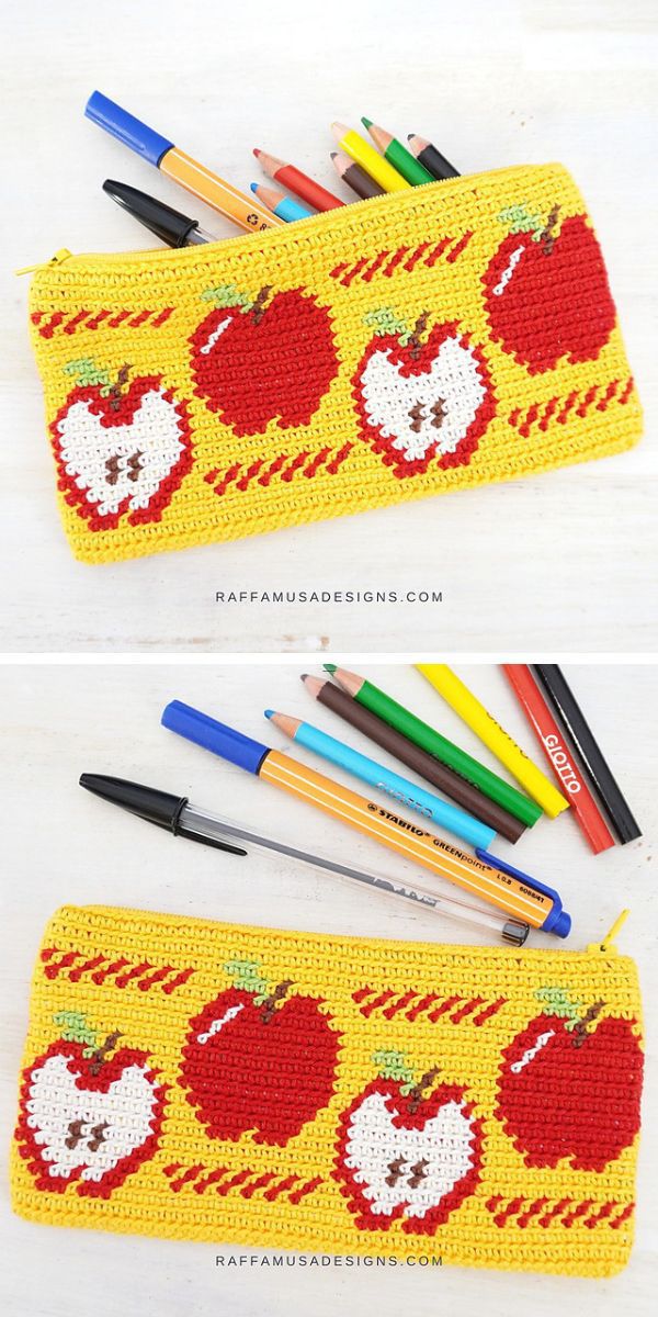 a yellow crochet pencil case with red apple motifs  