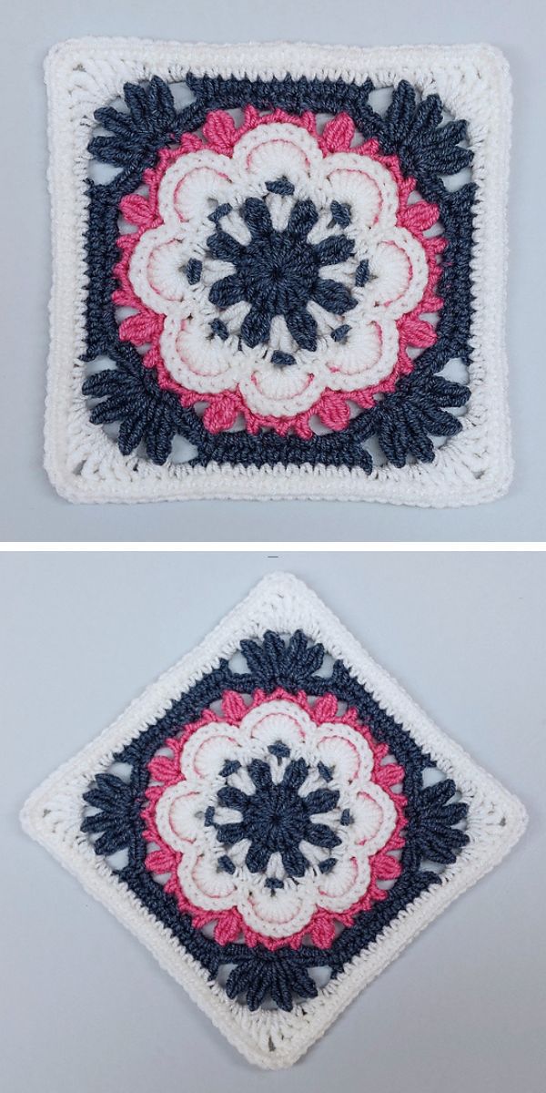 a granny crochet square with a flower motif in white, pink and dark blue colors