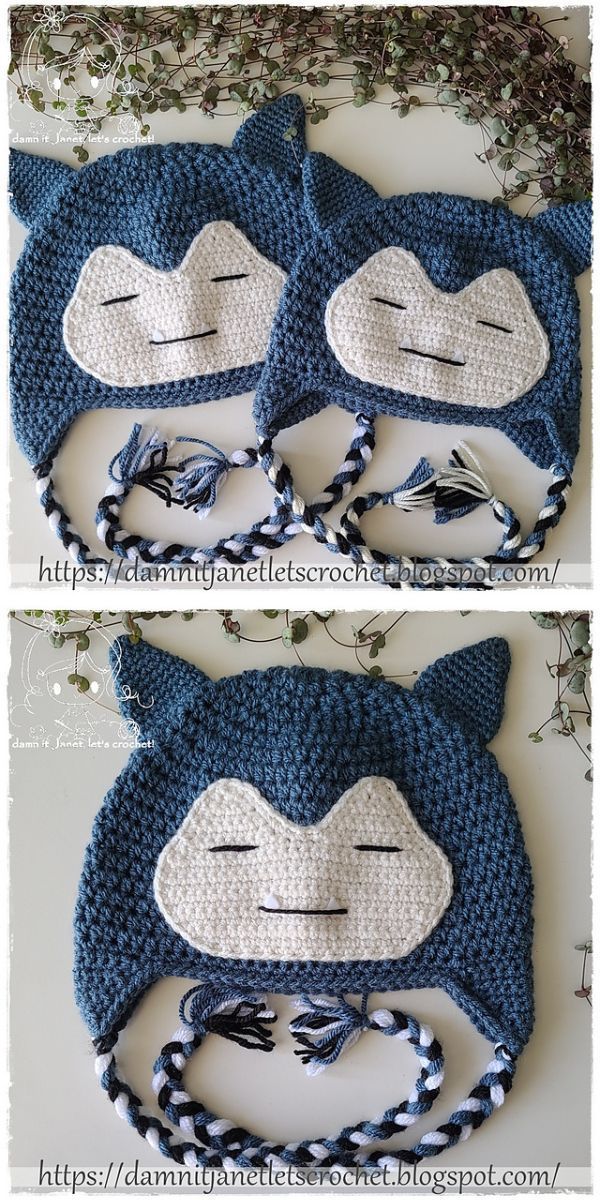 two dark blue crochet earflap beanies with ears on top featuring Snorlax Pokemon design
