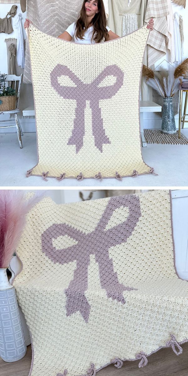 a crochet throw with a big bow motif in the center