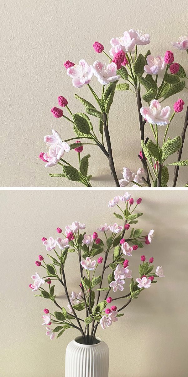 a white vase with crochet apple blossom flowers put inside