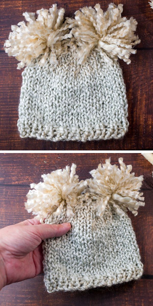 a knit beanie with two pom poms