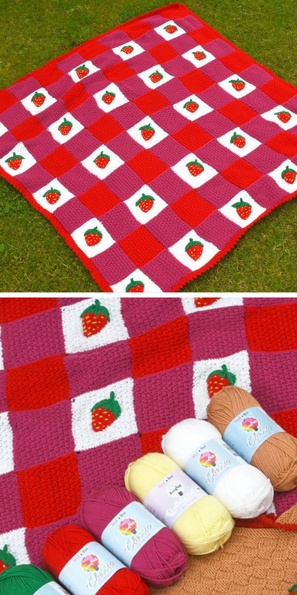 a knit chequered blanket with strawberry motifs
