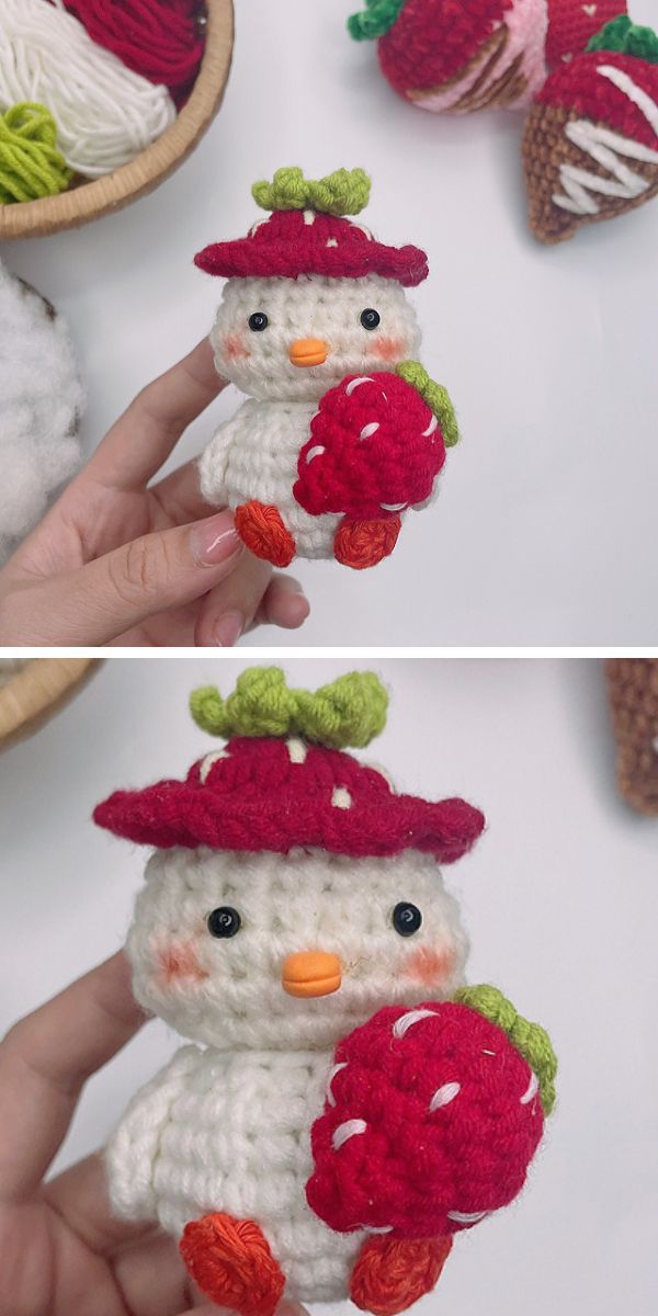 a crochet chicken amigurumi with a strawberry