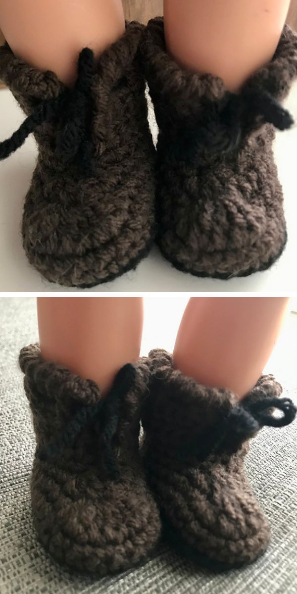 a pair of crochet doll boots in a dark color