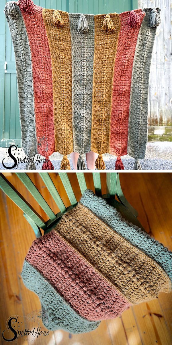 a striped crochet blanket with tassels