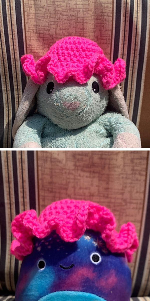 a pink crochet hat for dolls