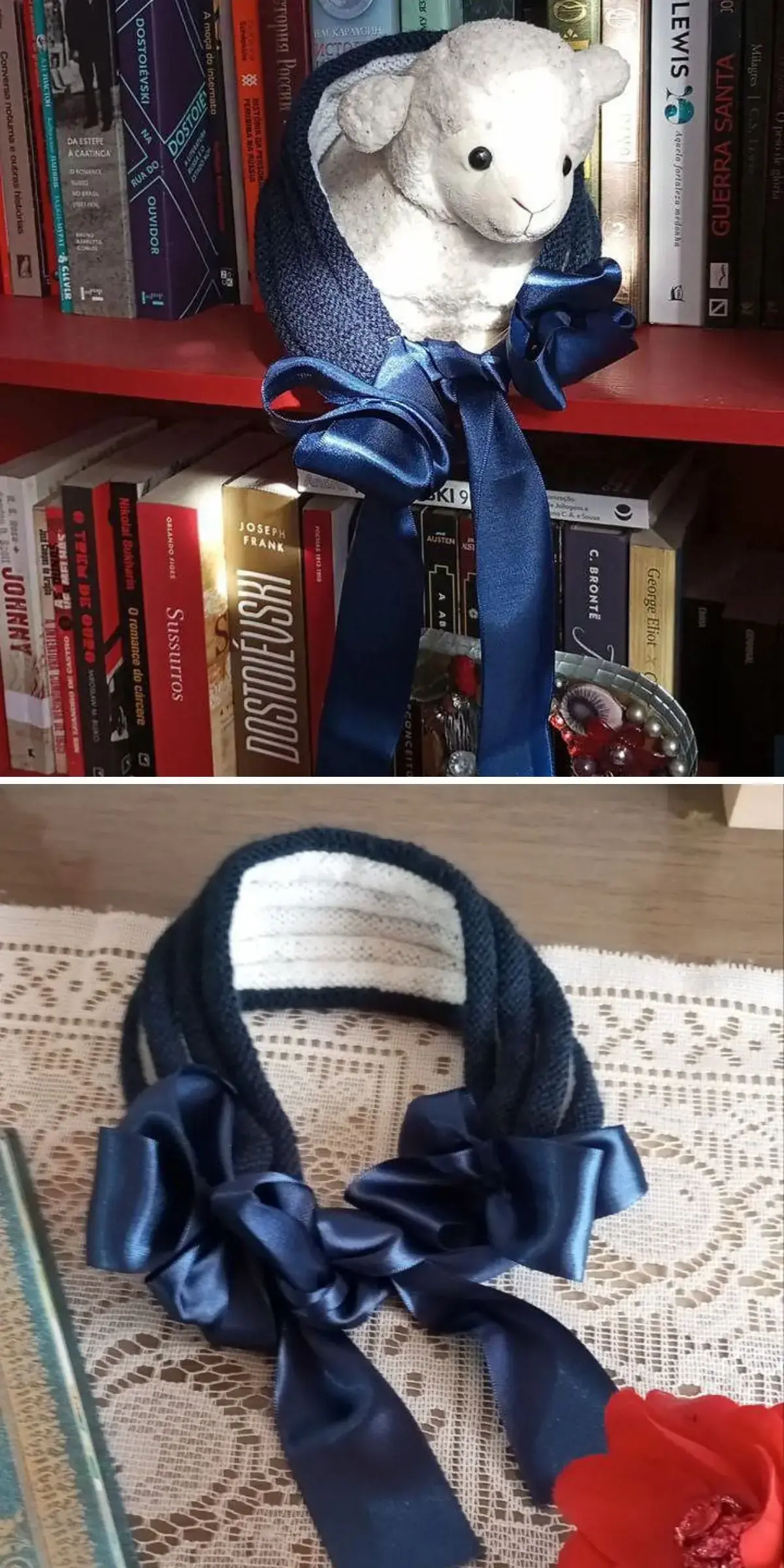 A stuffed lamb toy in a blue knitted bonnet displayed on a bookshelf.