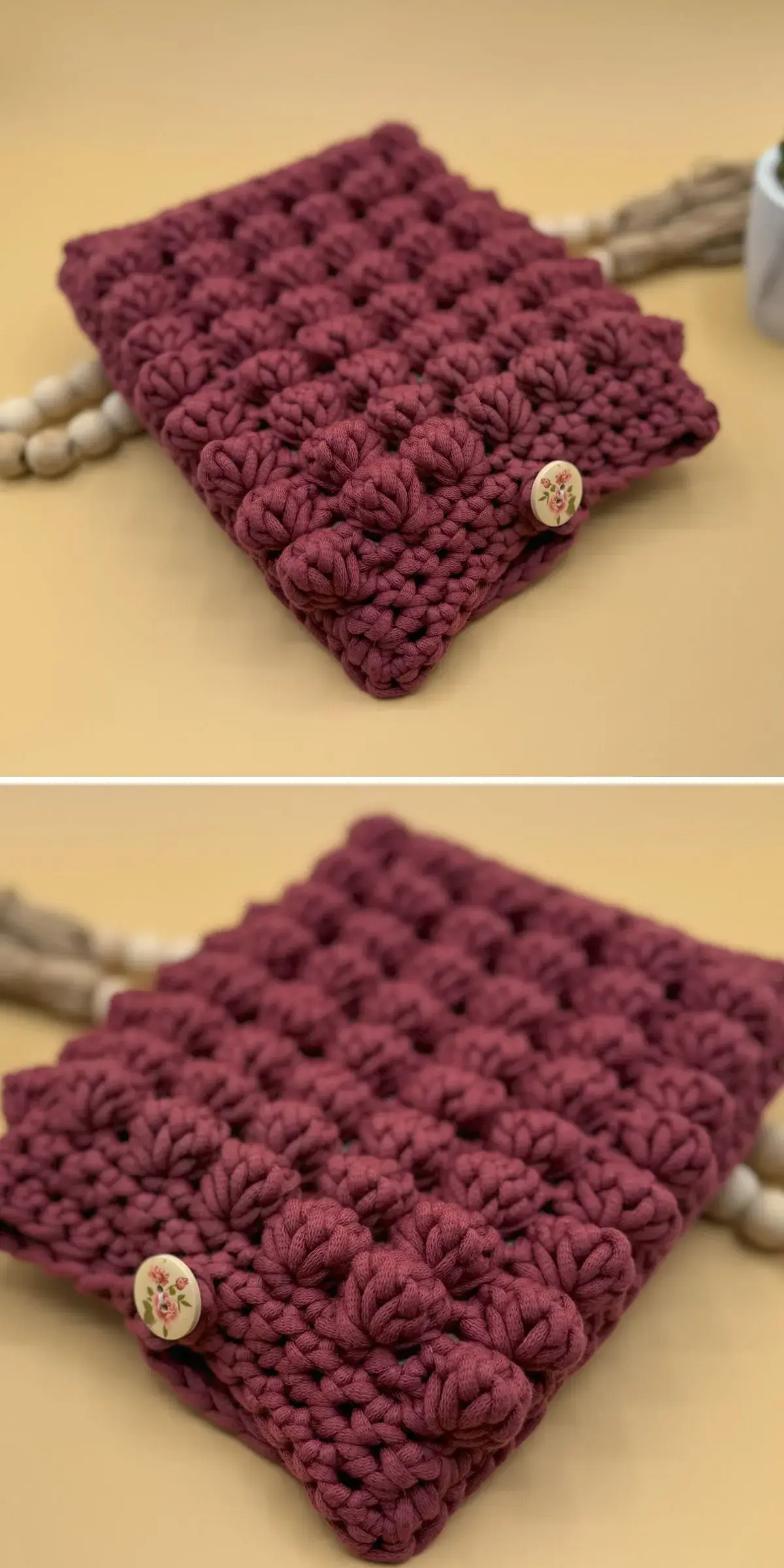 Red crochet kindle cover with a button closure on a beige surface, depicted from two angles.