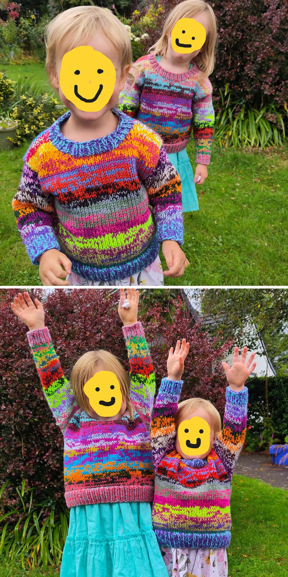 Two children in vibrant knitted baby sweaters and skirts stand with arms raised in a grassy garden, their faces joyfully adorned with yellow smiley face stickers.