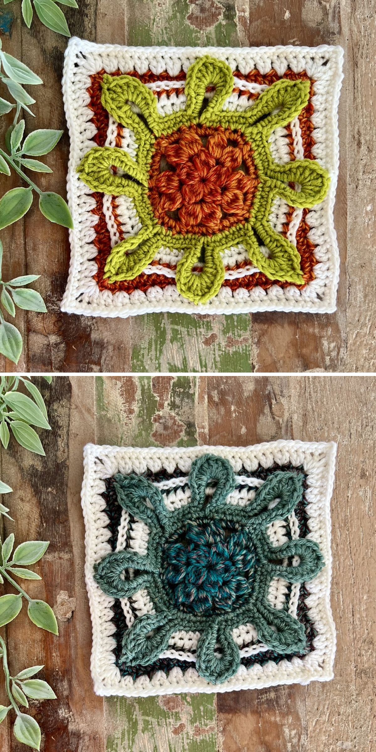 Two crochet squares boast intricate floral designs: the top showcases green and orange hues, while the bottom displays teal and dark green, each beautifully bordered in white. Leaves gracefully flank the sides, enhancing their charm.
