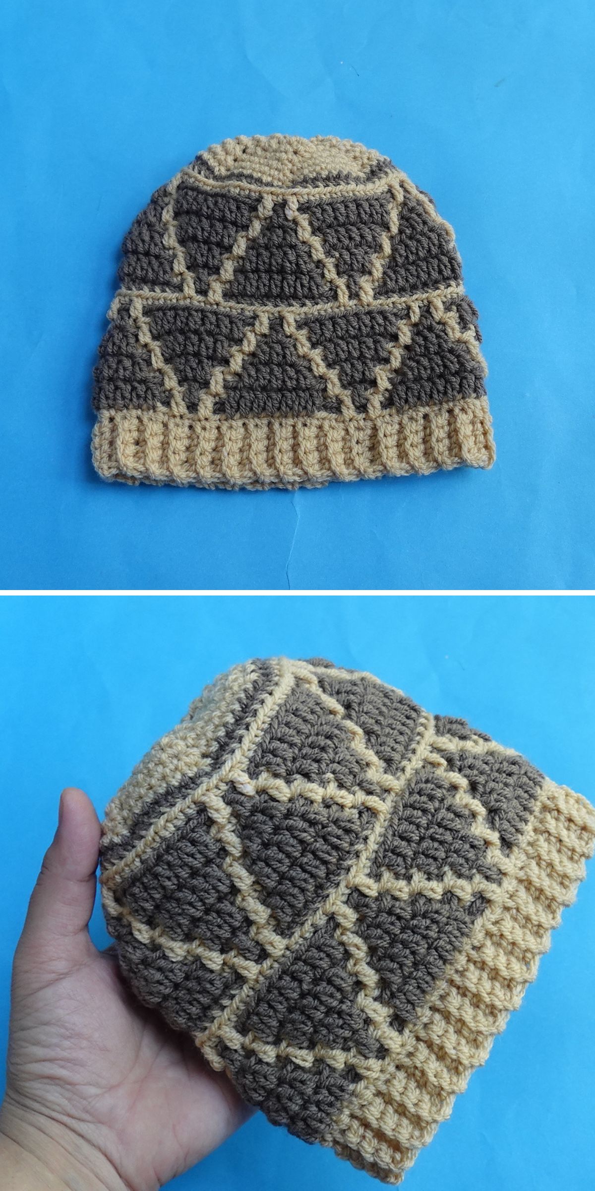 A crochet beanie with a geometric pattern in brown and beige, shown flat and held in a hand against a blue background.