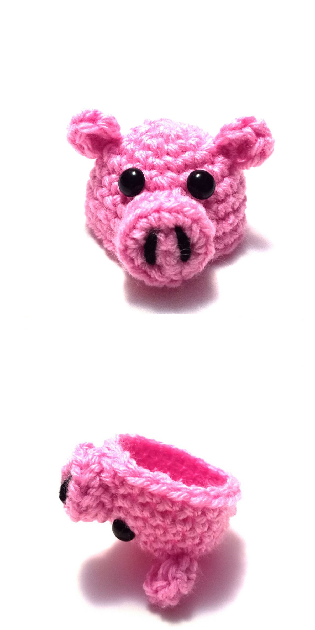 A small pink crocheted hat shaped like an amigurumi pig's head with black button eyes, shown from the front and side.