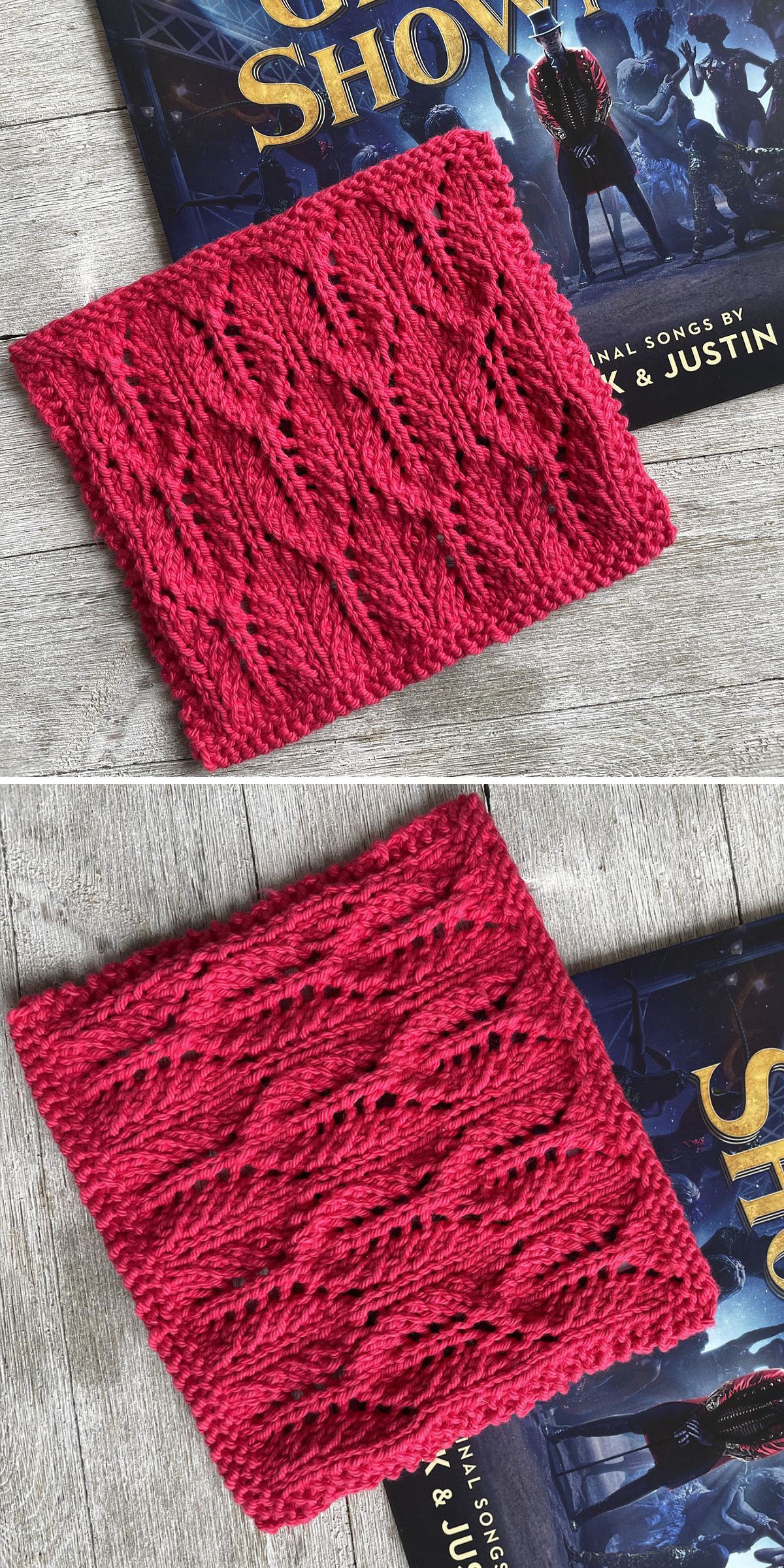 Two square swatches of red lace knit fabric, perfect as a knitted dishcloth, are placed on top of a "The Greatest Showman" songbook on a wooden surface.