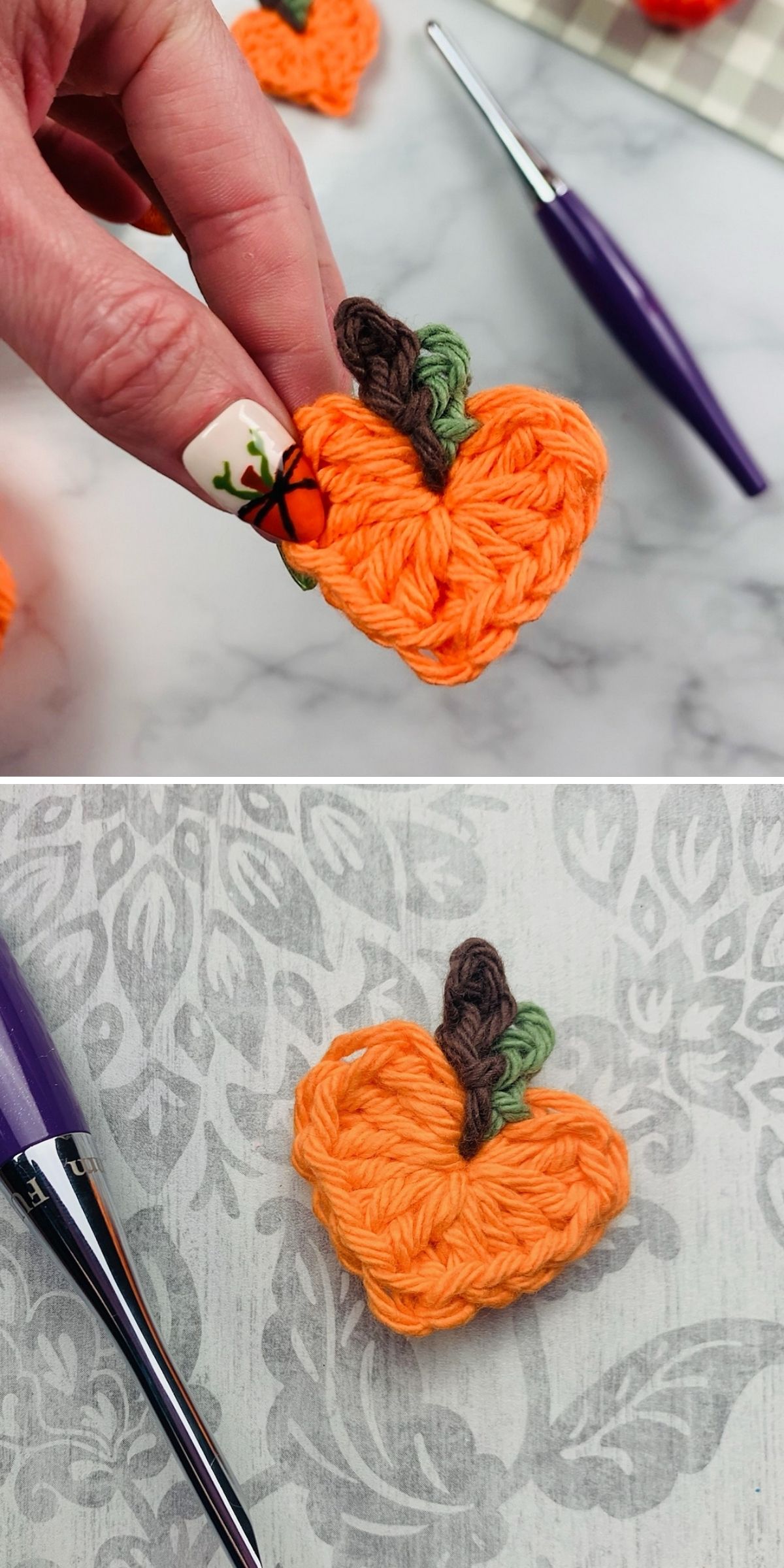 A hand holds a small orange crochet pumpkin next to a purple crochet hook.