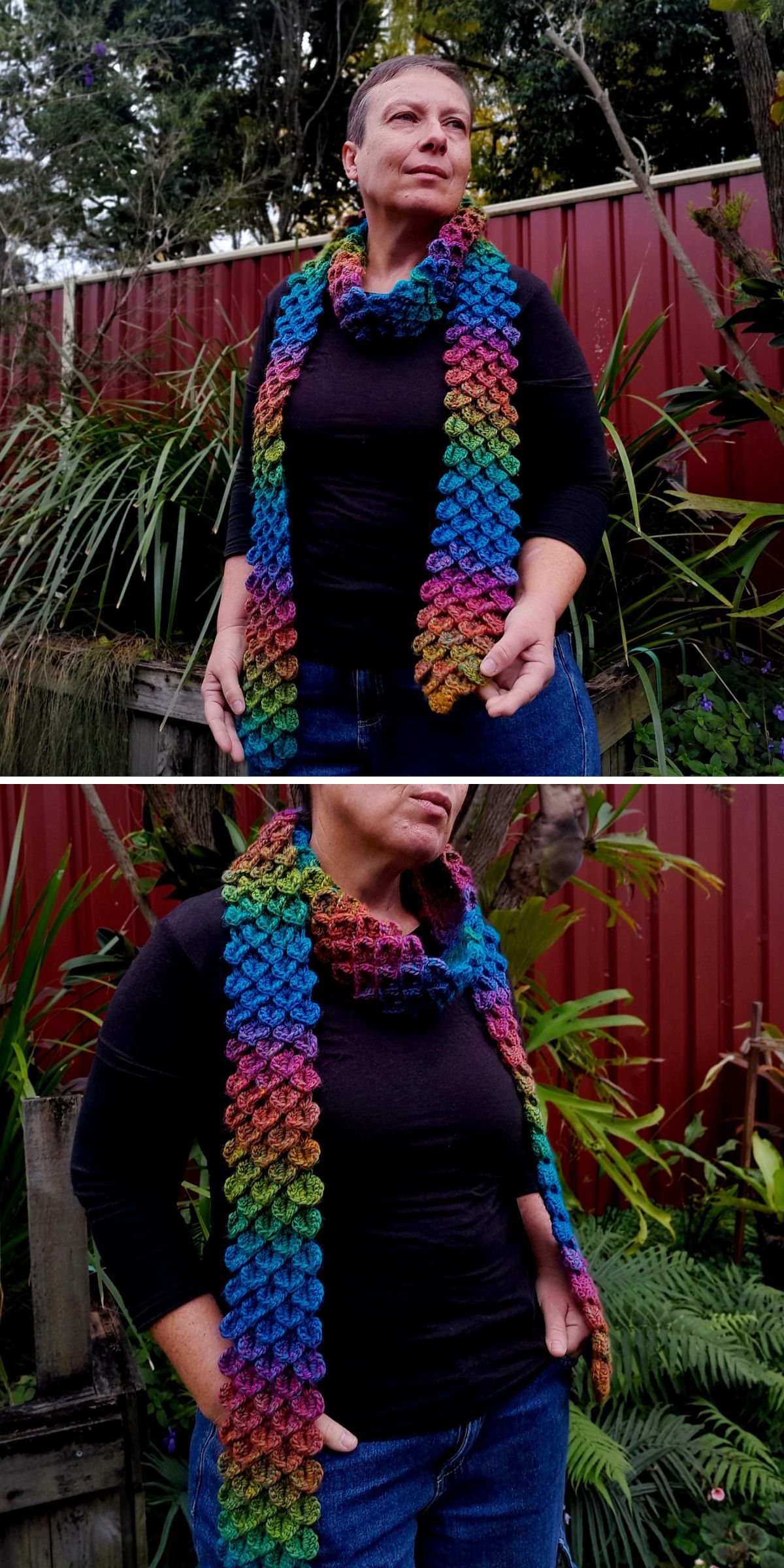 A person wearing a black top and jeans stands outside, modeling a colorful, textured crochet scarf — one of the must-have Crochet Winter Accessories 0 —in front of a red fence and greenery.