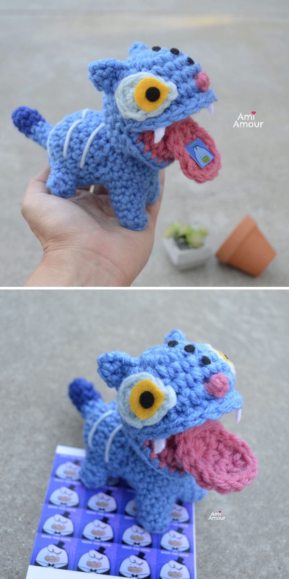 A hand holds a blue crocheted monster with bulging yellow eyes and an extended tongue; the toy is shown again on a flat surface with stickers and a small plant in the background.