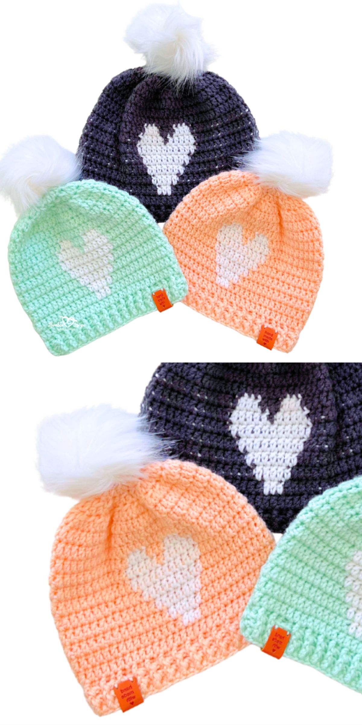 Three crochet baby hats with white hearts and faux fur pom-poms, in navy, mint green, and peach, are displayed overlapping on a white background.