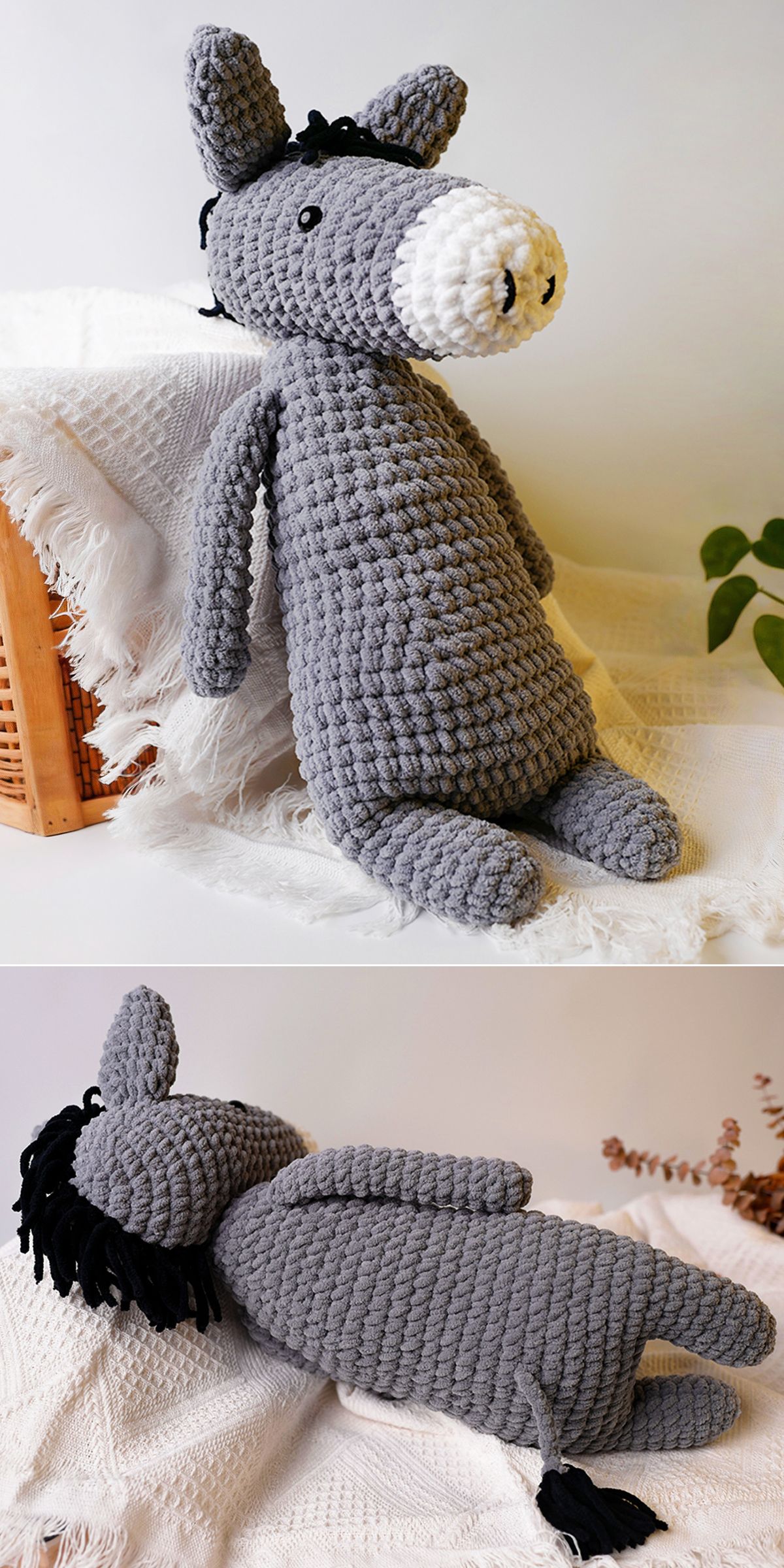 A gray crochet donkey amigurumi plush toy with a white snout, black mane, and tail is shown sitting upright and lying down on a white textured blanket.