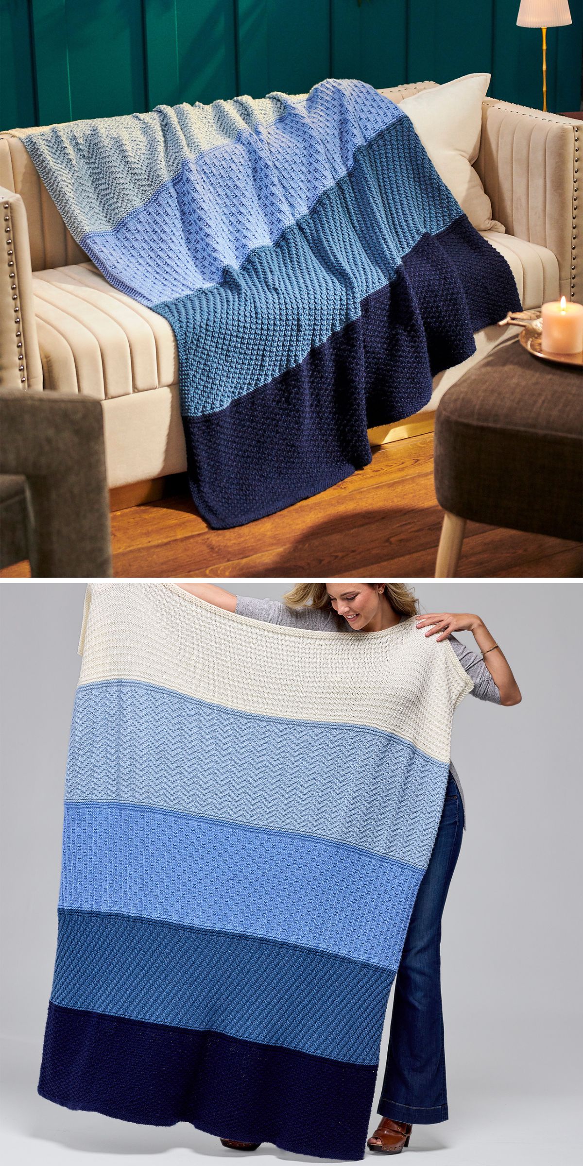 A knitted blanket with wide horizontal stripes in cream, light blue, medium blue, and navy is draped over a sofa and held up by a person.