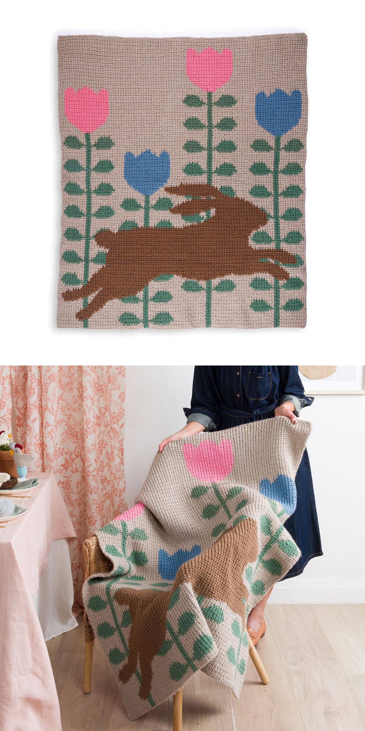 A crochet blanket featuring a brown hare leaping among tall pink and blue flowers, perfect as cozy crochet Easter decor, shown laid flat and draped over a chair.