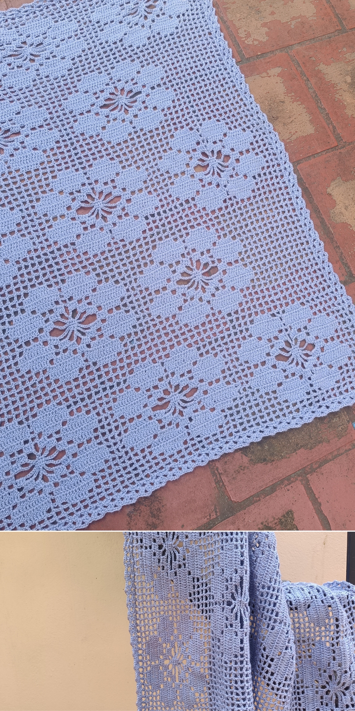 A light blue, hand-crocheted blanket featuring a floral grid pattern in the style of filet crochet, shown laid flat on a brick surface and folded against a plain wall.