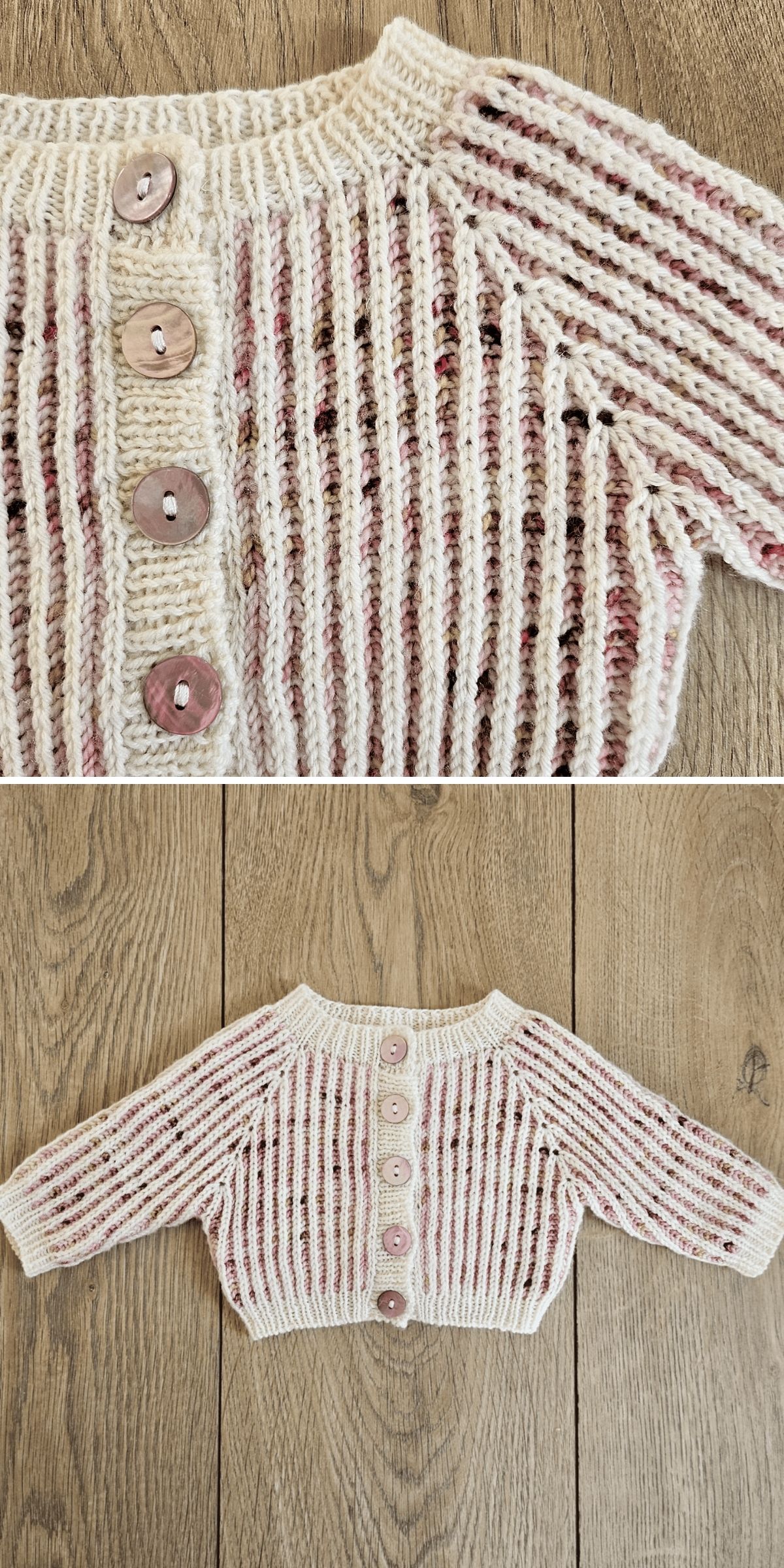 A knit baby cardigan with pink buttons and a ribbed pattern in cream and speckled yarn, displayed on a wooden surface.