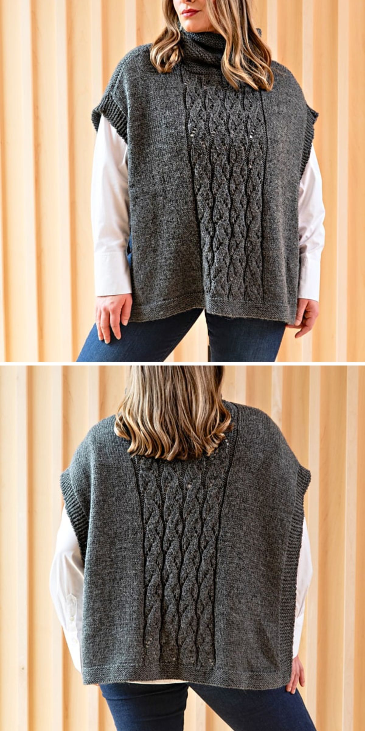 A woman models one of our cozy knitted ponchos — a gray design featuring a textured cable pattern down the front and back — layered effortlessly over a white shirt and jeans as she stands against a wooden backdrop.