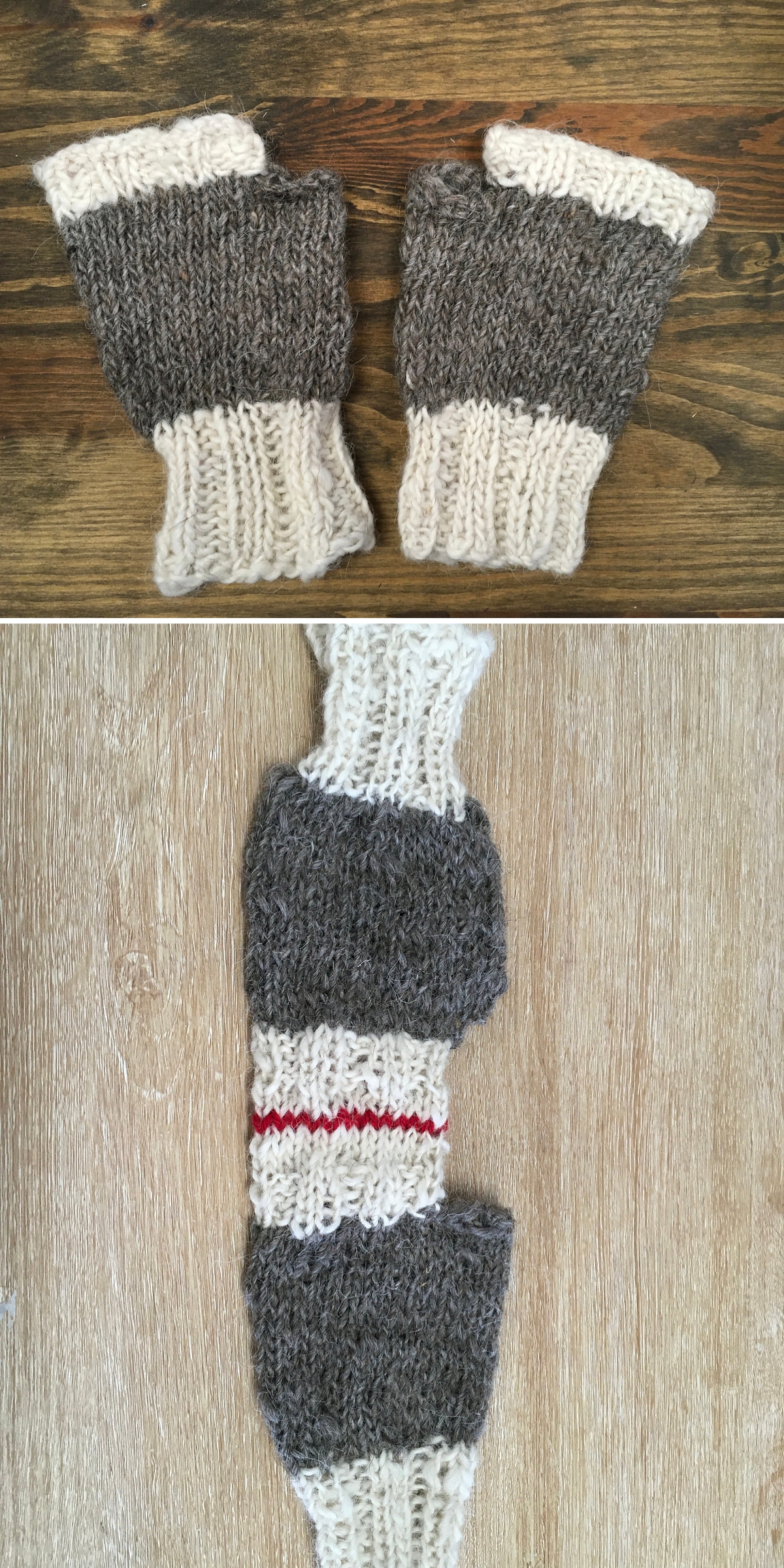 Two pairs of knit fingerless gloves, hand-knit in gray with white cuffs, are displayed on a wooden surface; one pair features a red stripe accent.