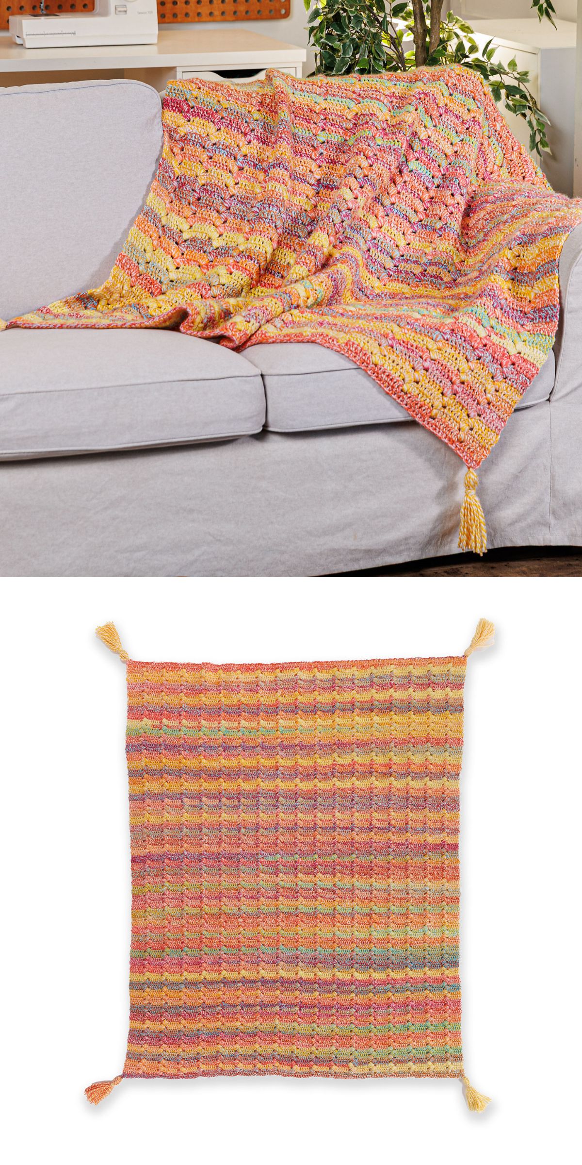 A multicolored crochet throw blanket with yellow tassels on each corner, displayed draped over a couch and laid flat.