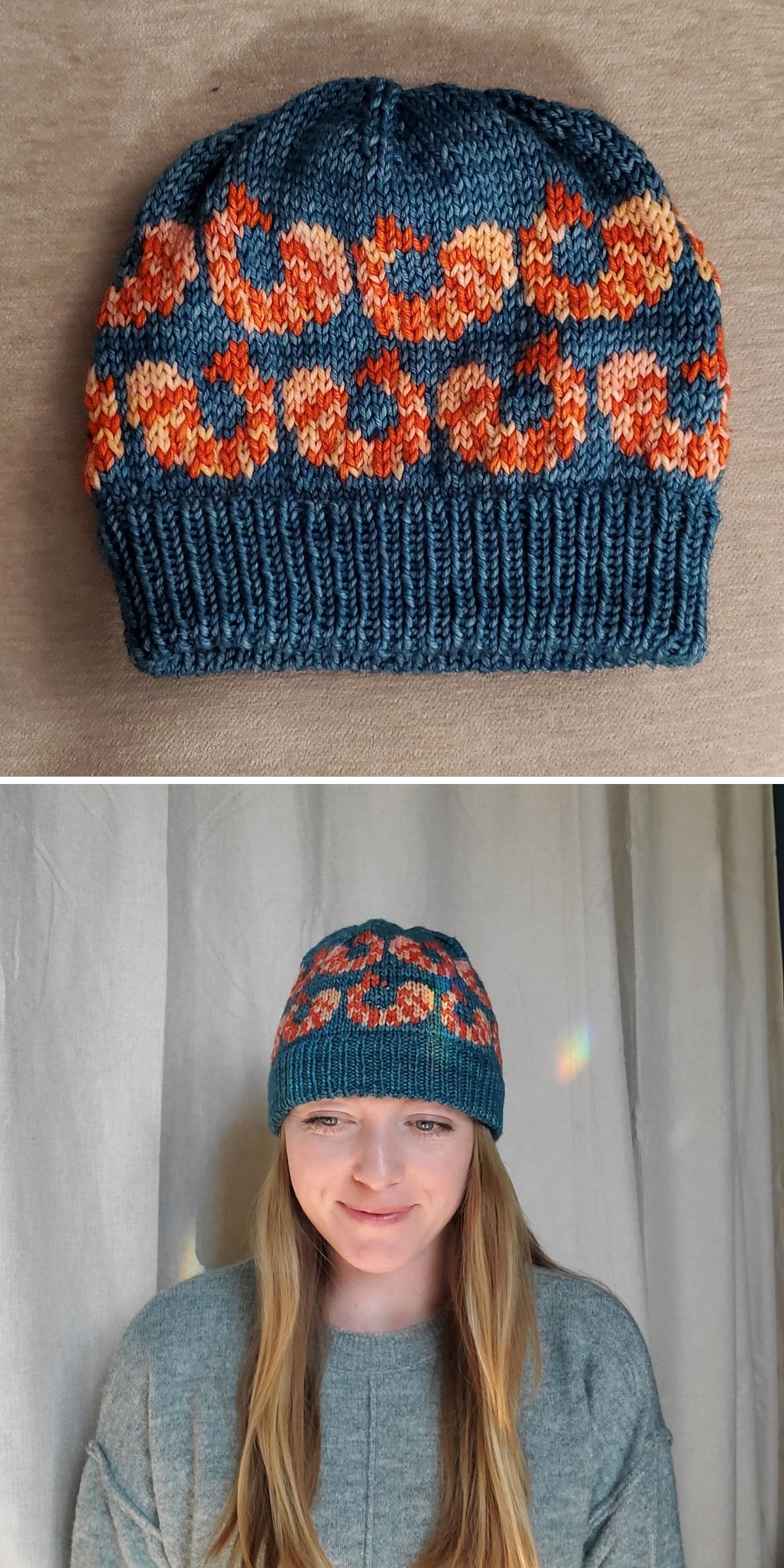 A blue knitted hat with an orange and yellow leopard print pattern, shown alone and worn by a person with long blonde hair, standing indoors.